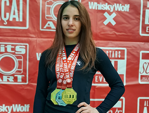 Denissa with medals around neck